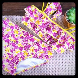 Pink and yellow floral bathing suit bikini set.